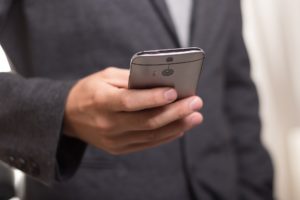 an executive using a phone