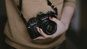 carrying a camera